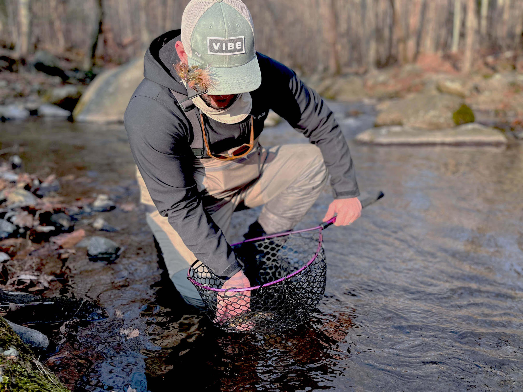 A man fishing in a river