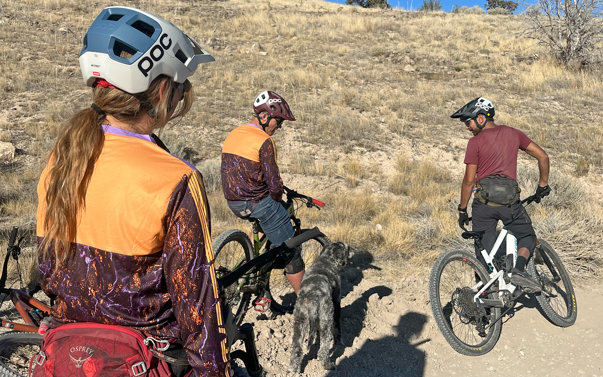 Three bikers wear Poc helmets.