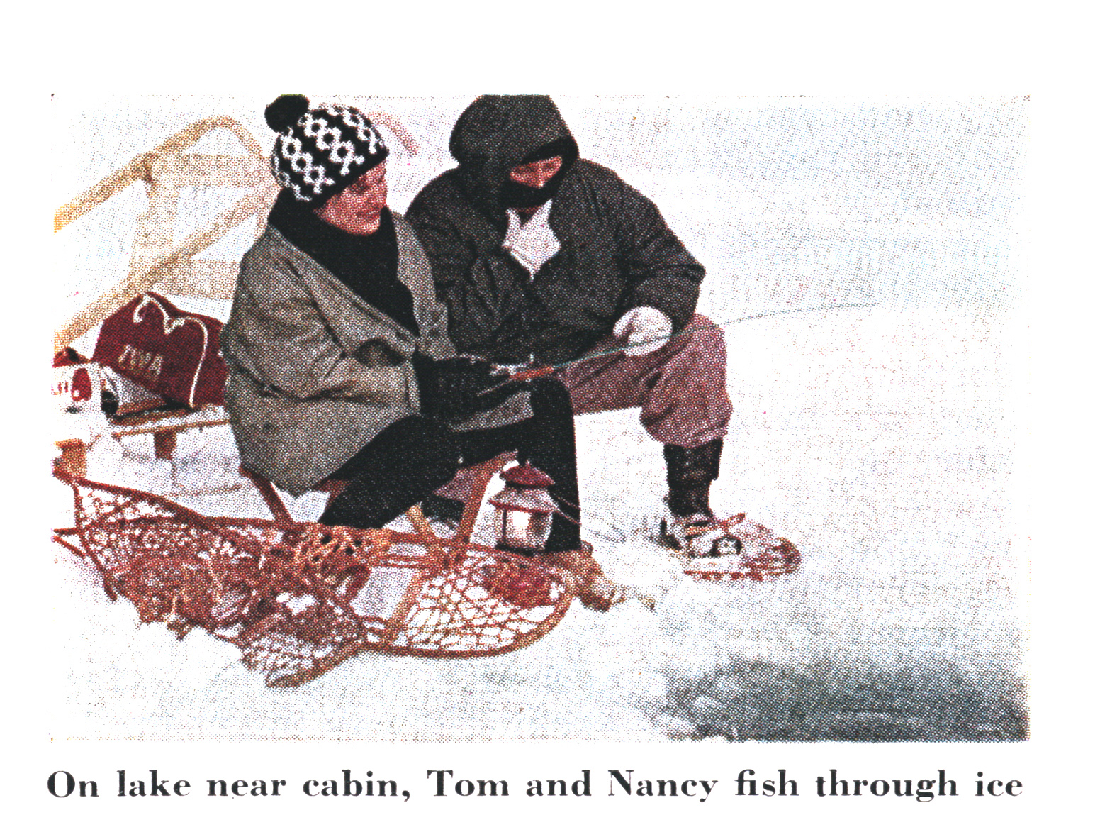 An old photo of a couple ice fishing.