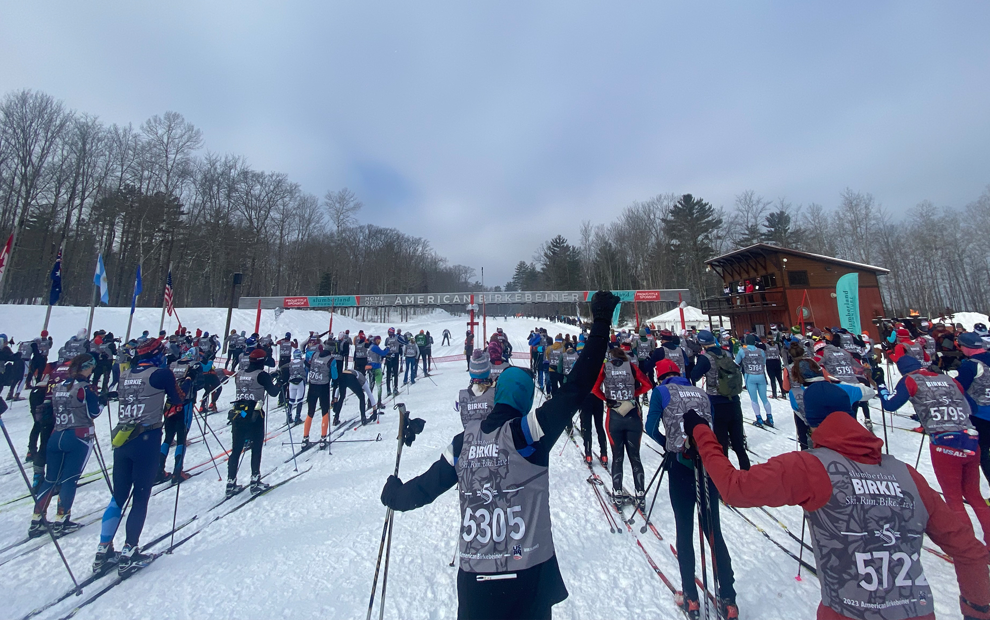 Cross country ski racers line up.