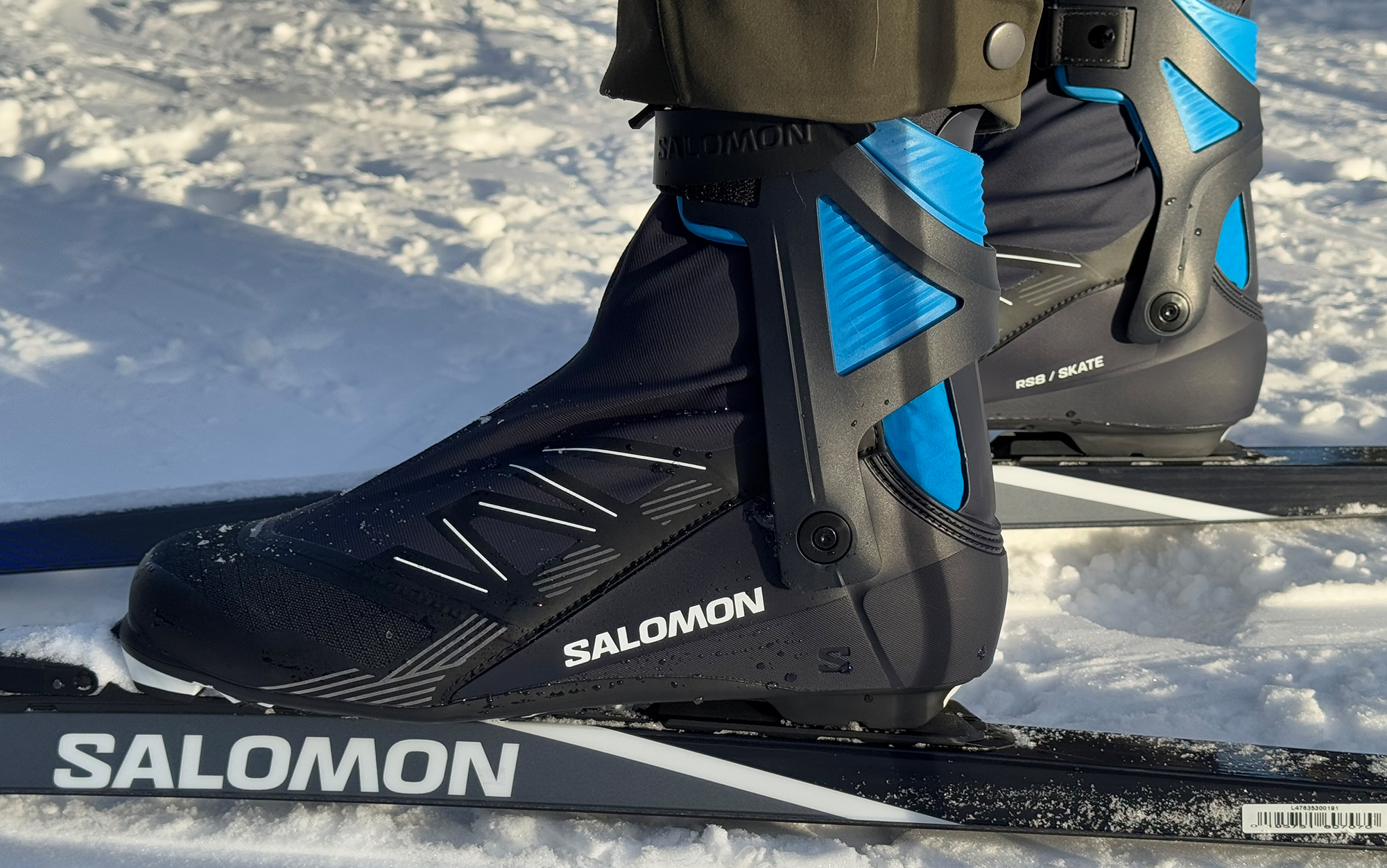 Skier wears cross country ski boot.