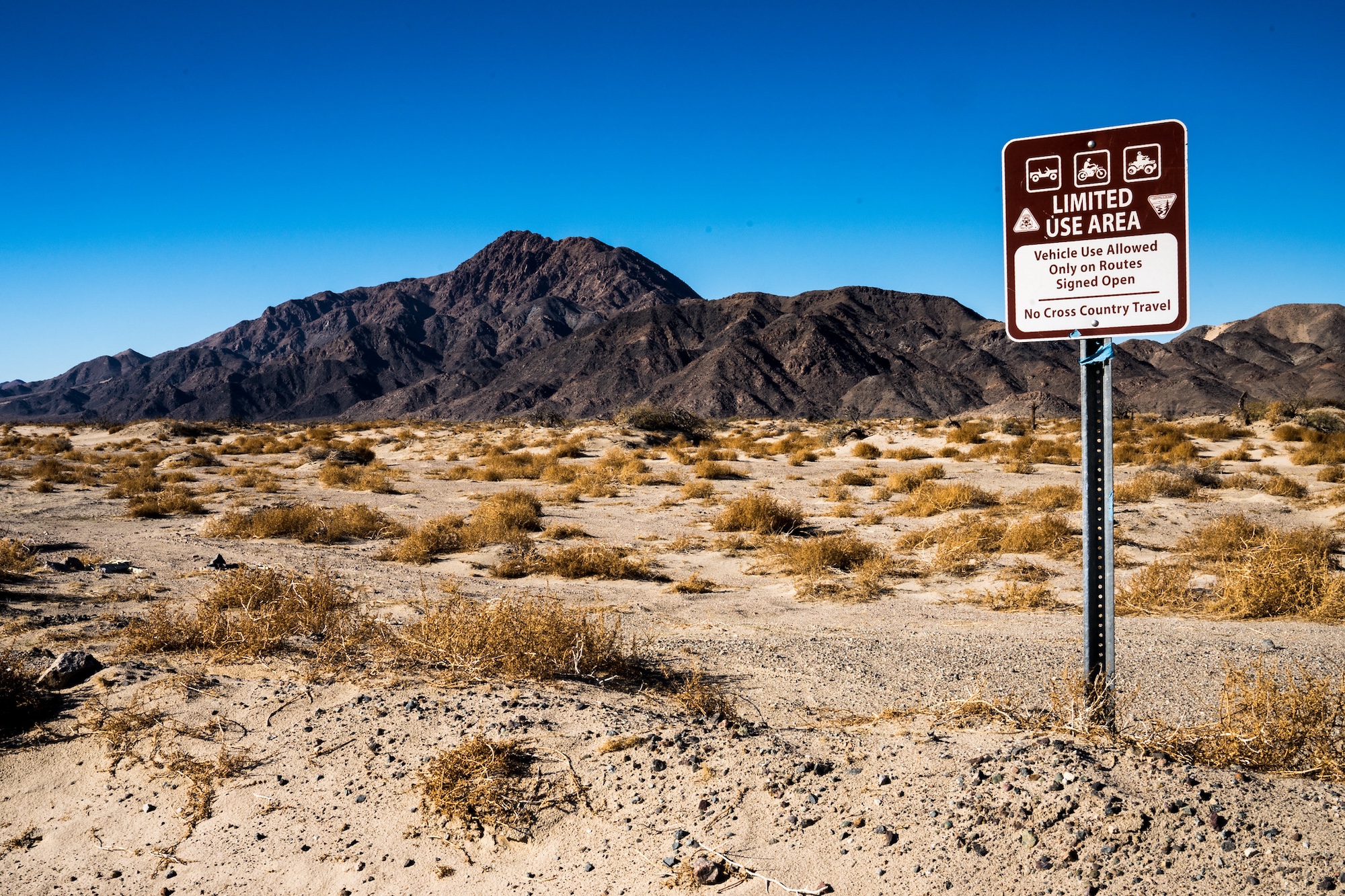 A BLM usage sign in an OHV area.