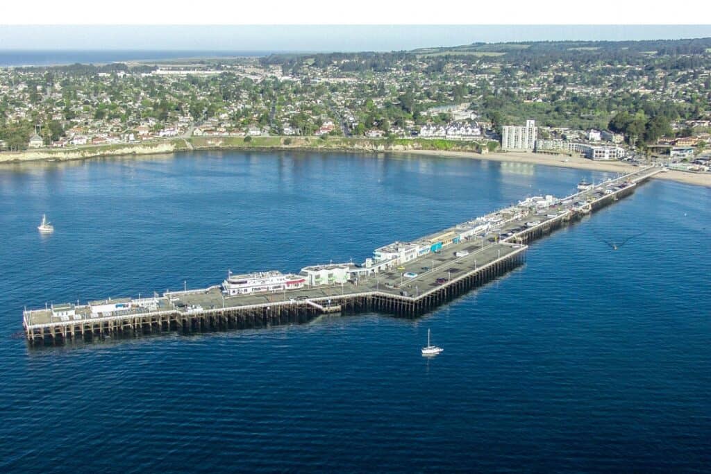 A drone shot of the nearby Santa Cruz Boardwalk.