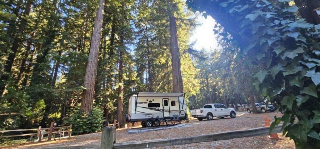 A truck and trailer at Santa Cruz Redwoods RV Resort.