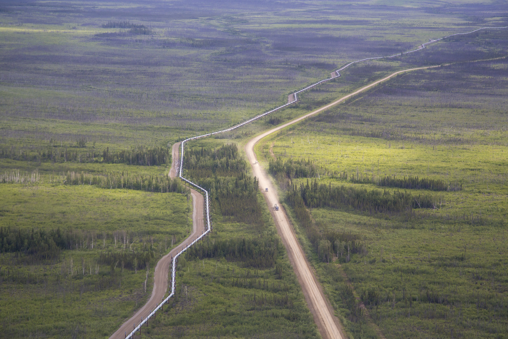 A pipeline runs past the Dalton Highway in Alaska.