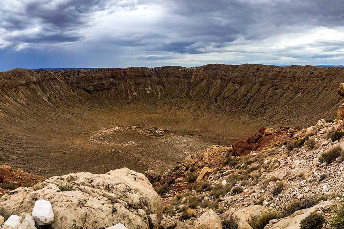 Meteor Crater — a deep depression in the desert floor.