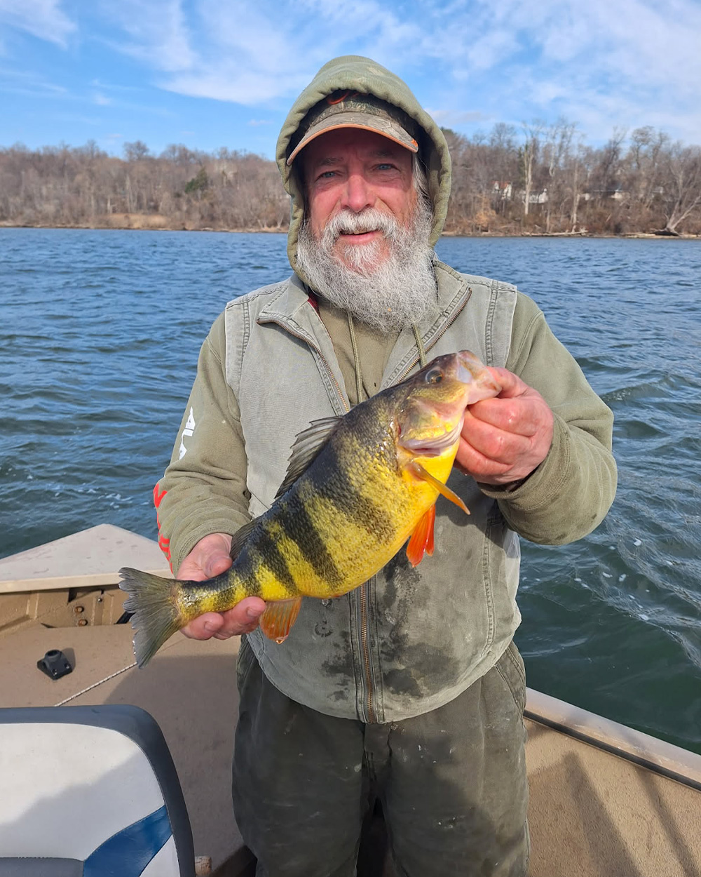 A Maryland angler holds up a yellow perch.