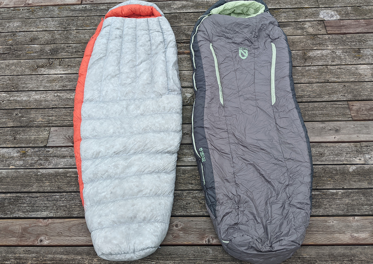 a down sleeping bag compared to a synthetic fill on the right.