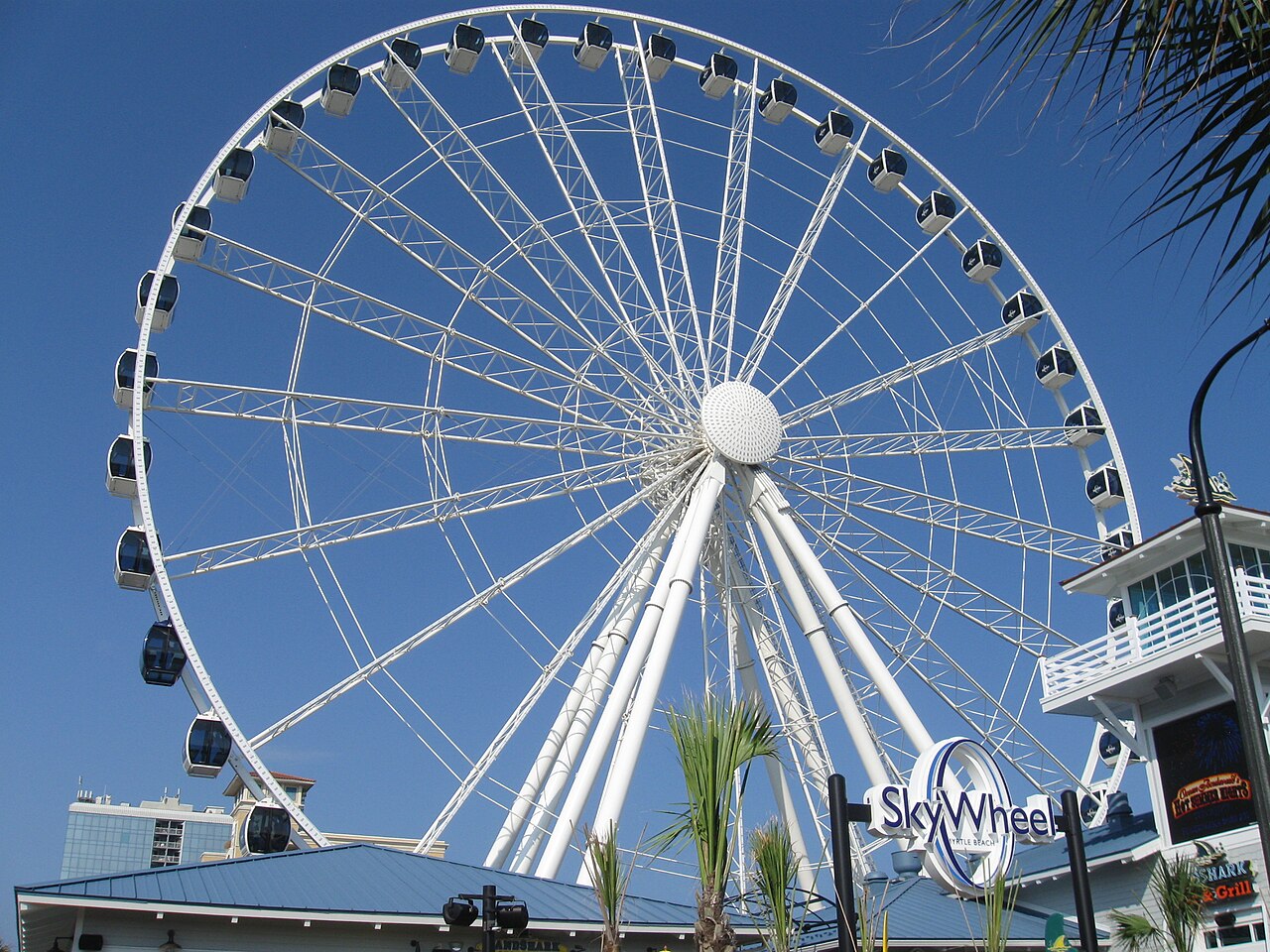 Shot of mammoth Ferris wheel with pods