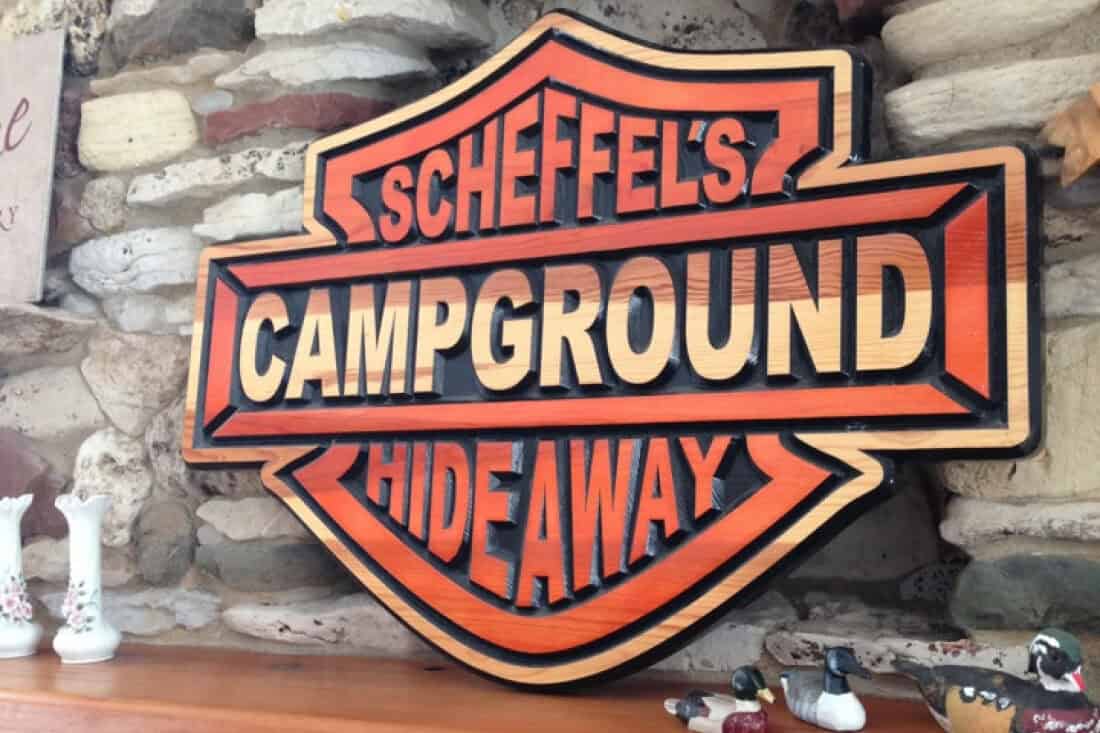 A sign reading Scheffel's Campground Hideaway.