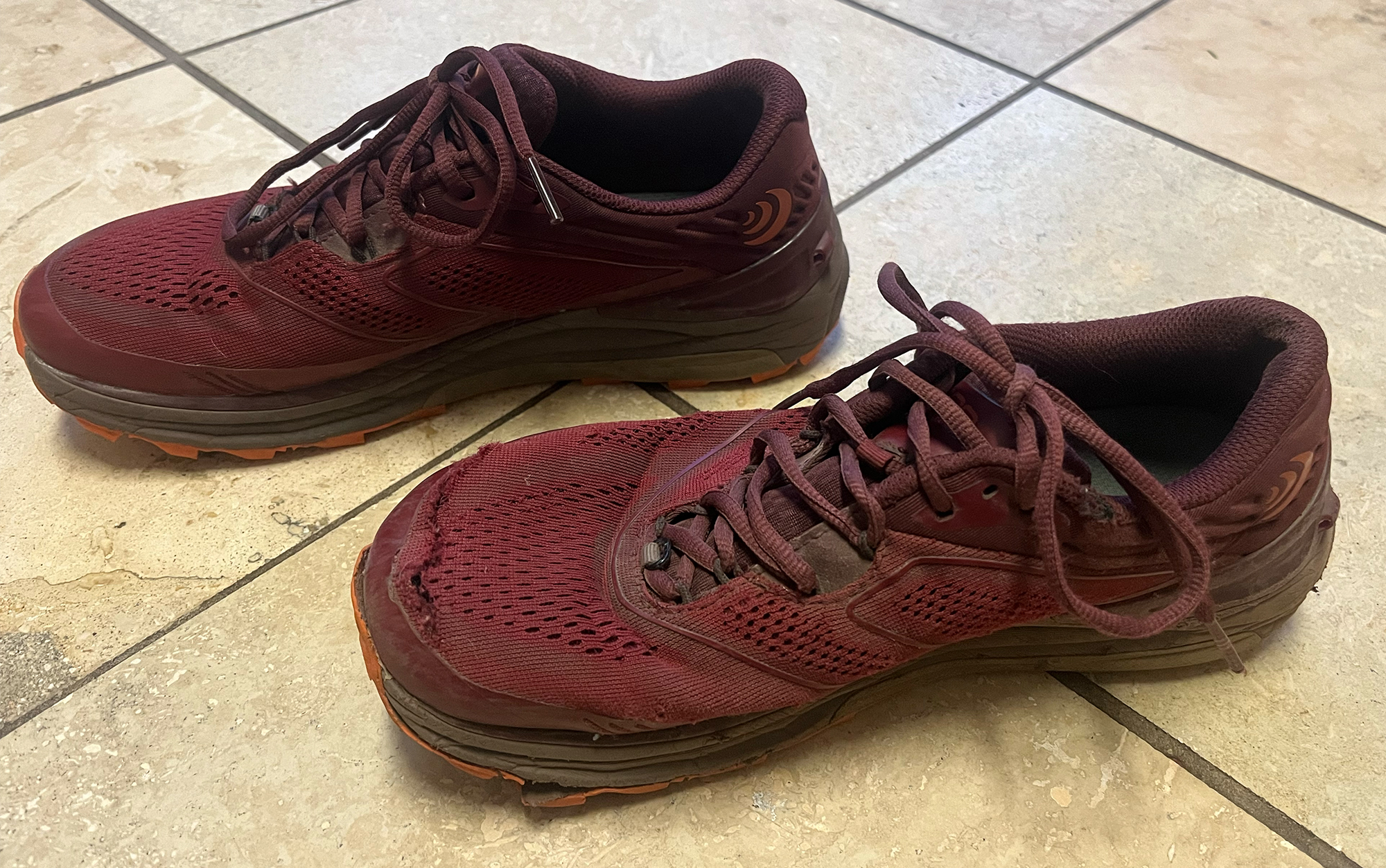 A new Ultraventure 2 women's hiking shoes sit next to their predecessor.