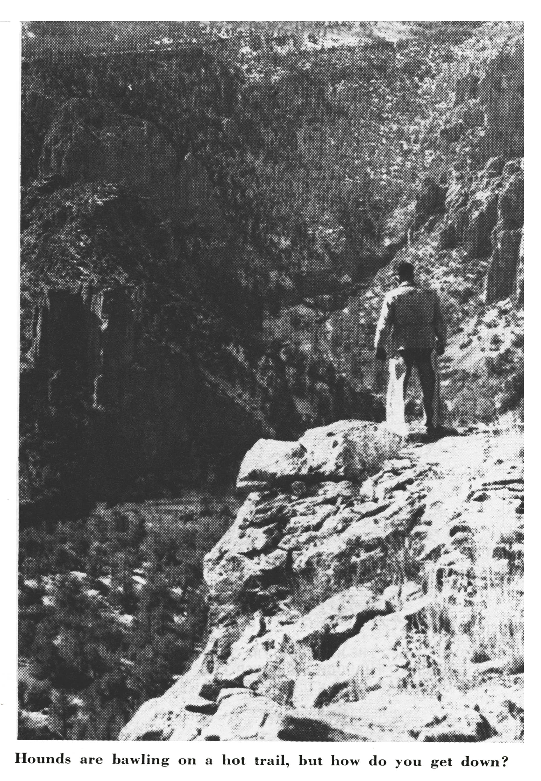 A hunter stands on a canyon edge