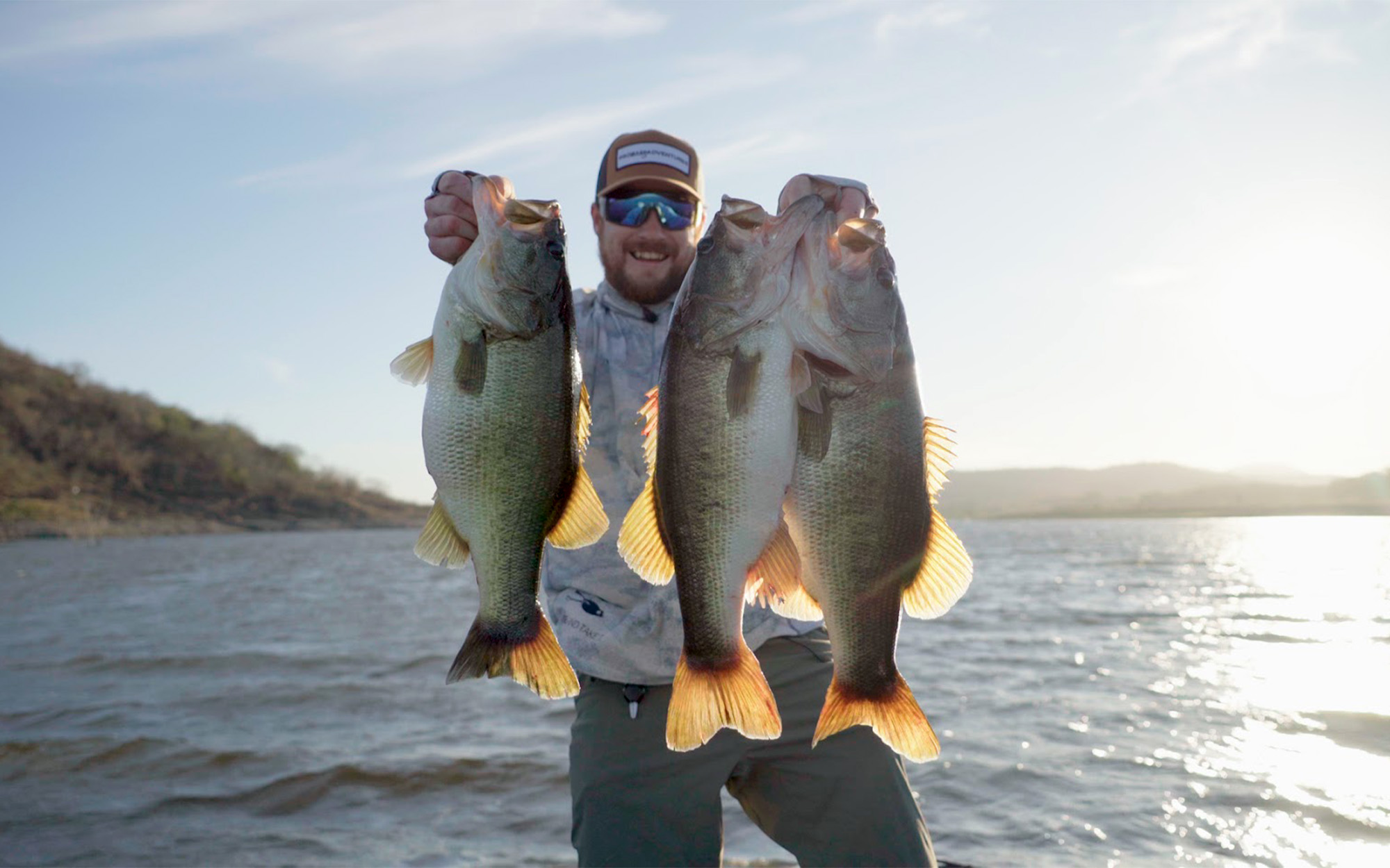 A Texas angler lips three bass at once.