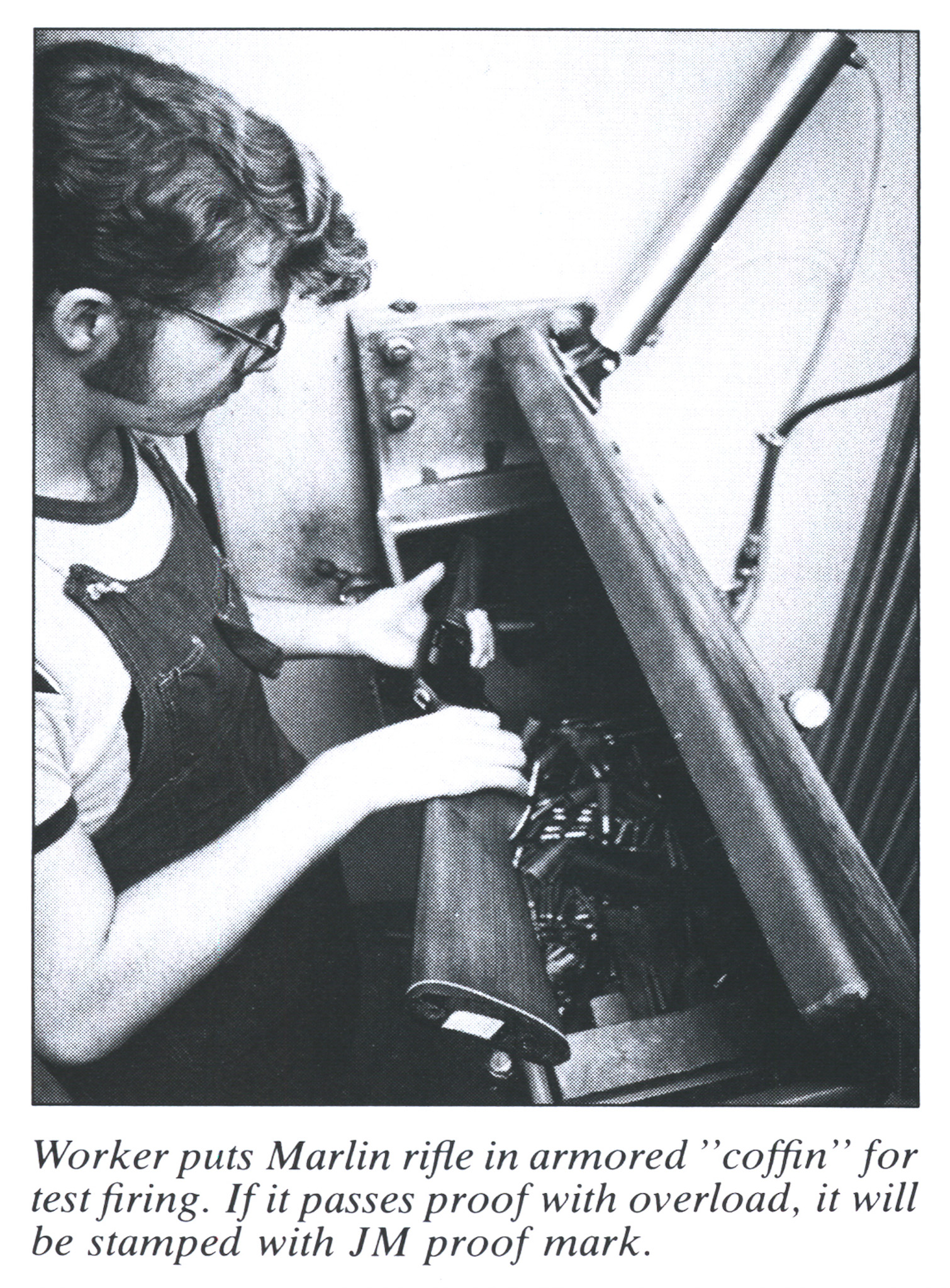 An old black and white photo of a proofing process for a gun.