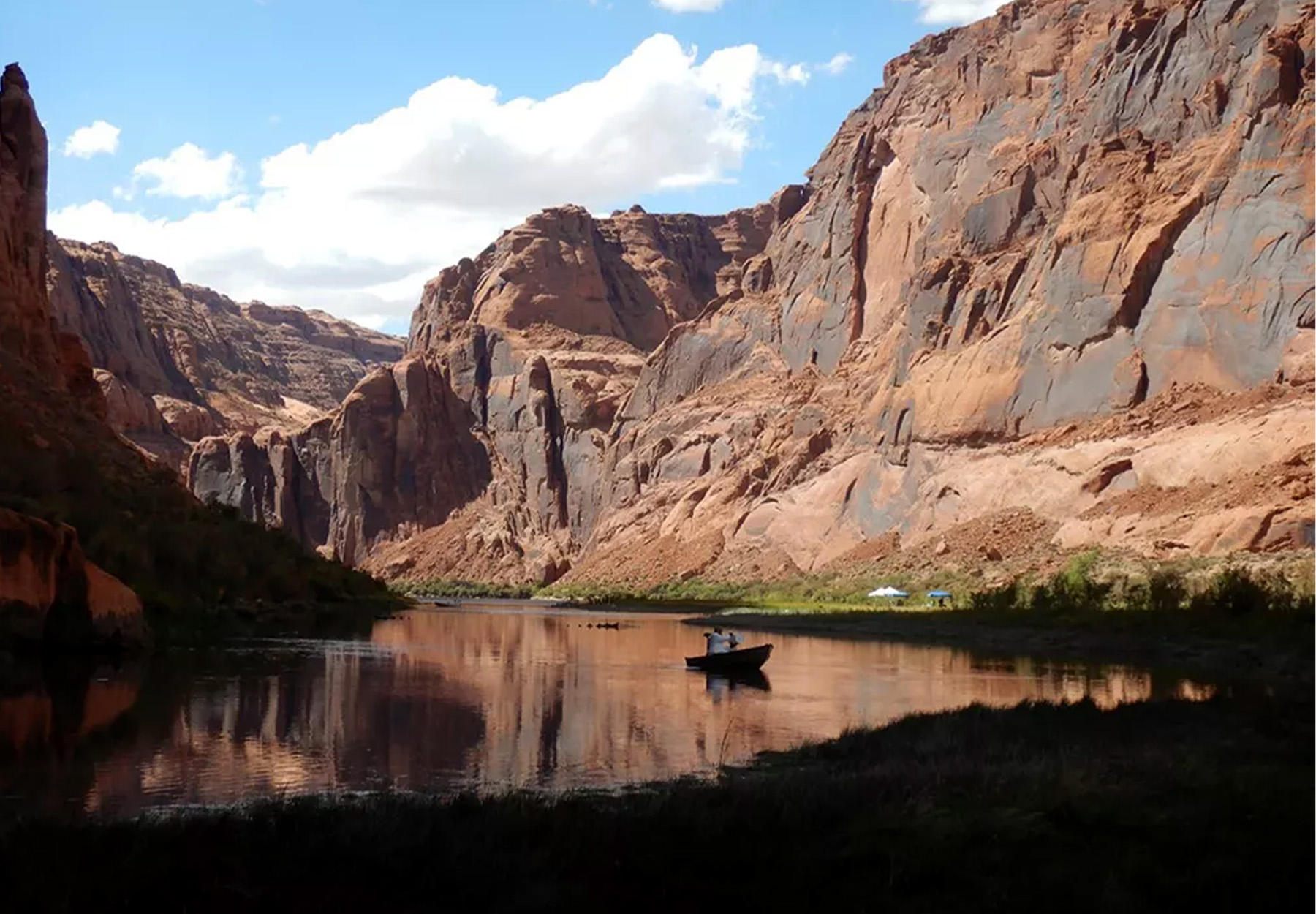 A boat floats on a stretch of the Colorado River near Lees Ferry.