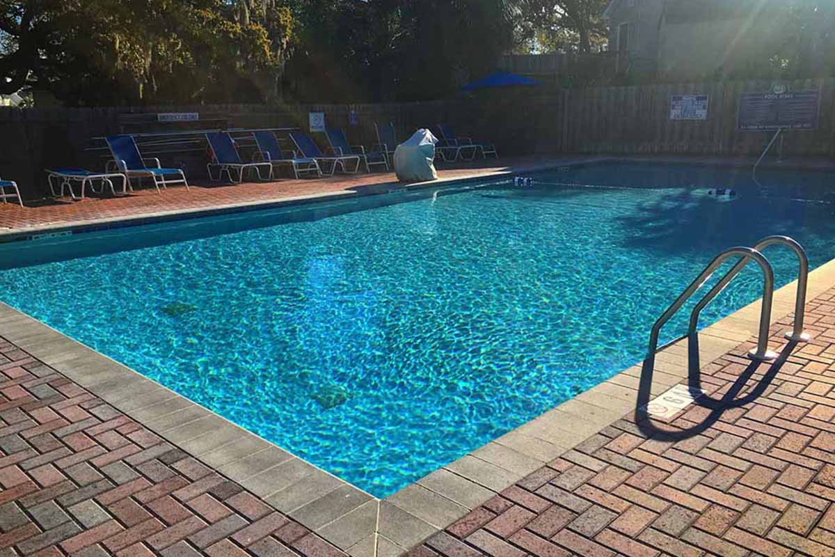 Swimming pool sparkling in the sun.