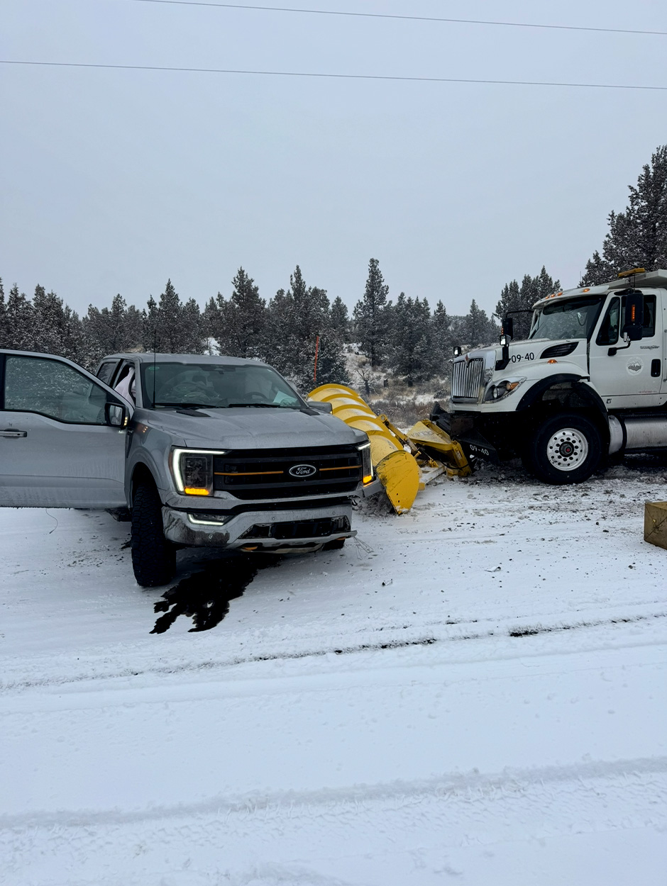 An accident involving a Ford truck and a snowplow.