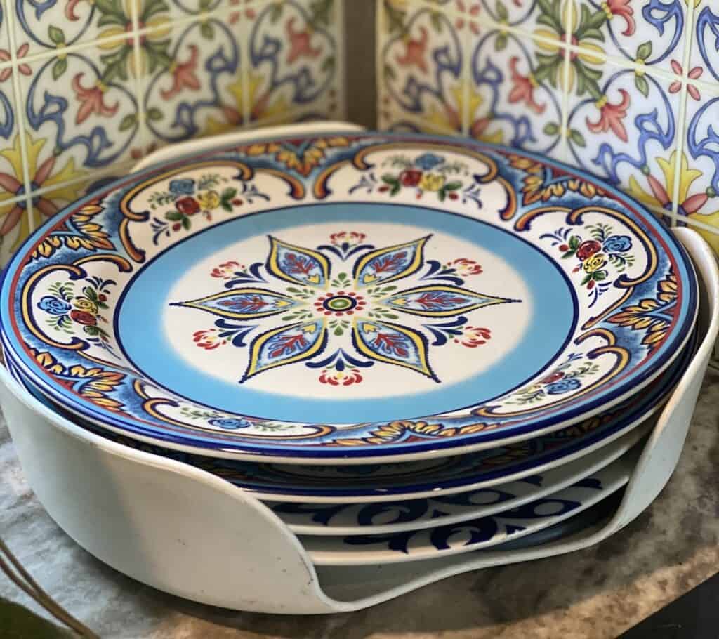 Plates stacked neatly on a Camco Stack-A-Plate organizer