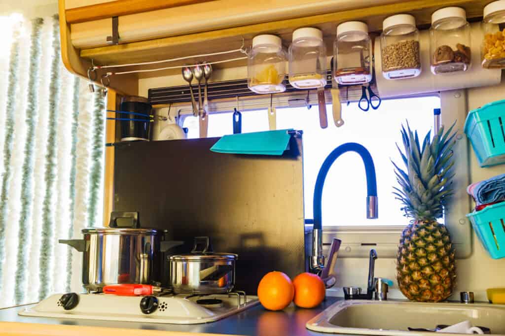 RV kitchen showing  storage ideas