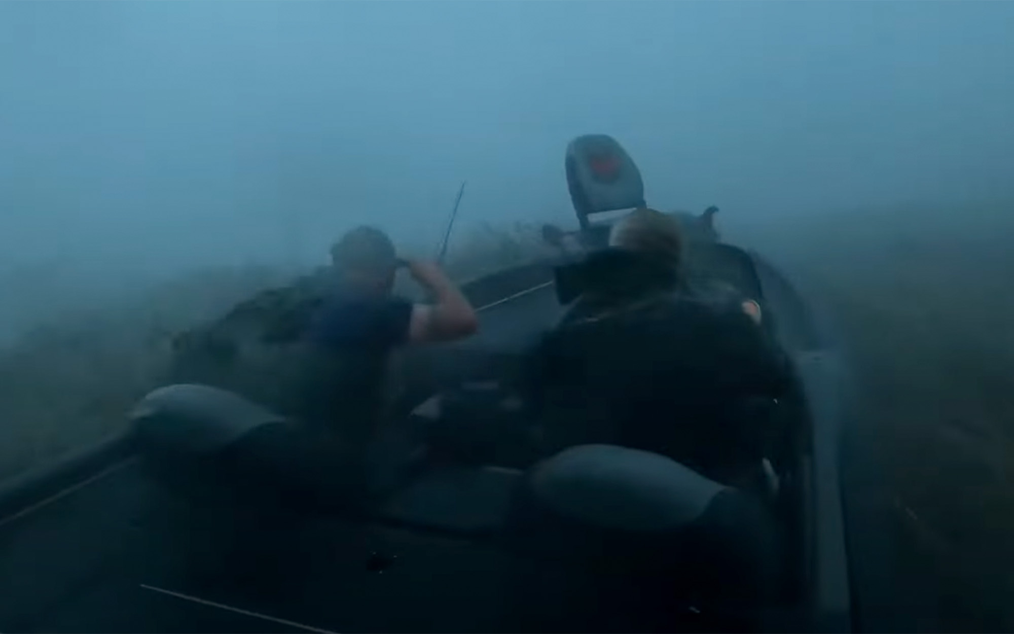 Two anglers run their boat through a tornado.