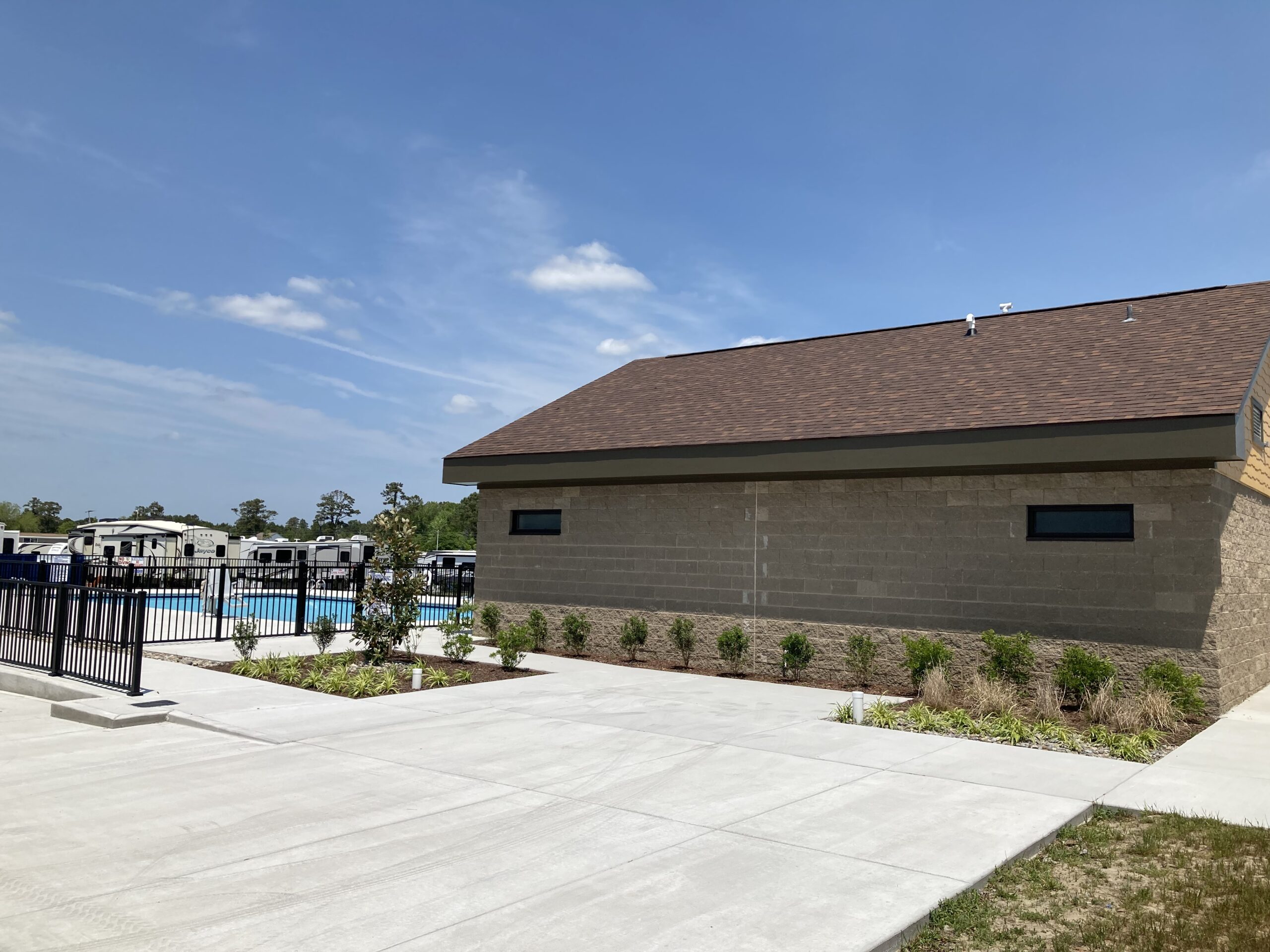 Poolhouse next to pool.