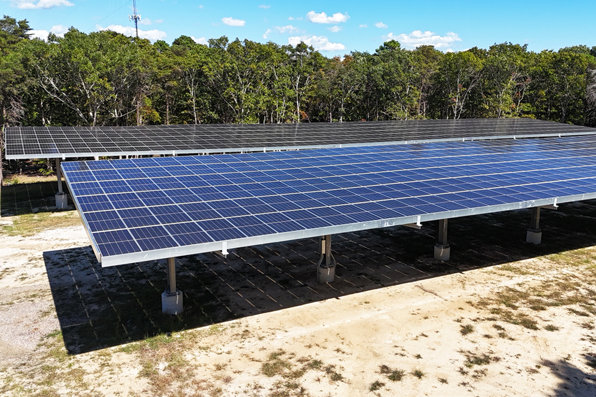 Two storage roofs covered by solar panels.