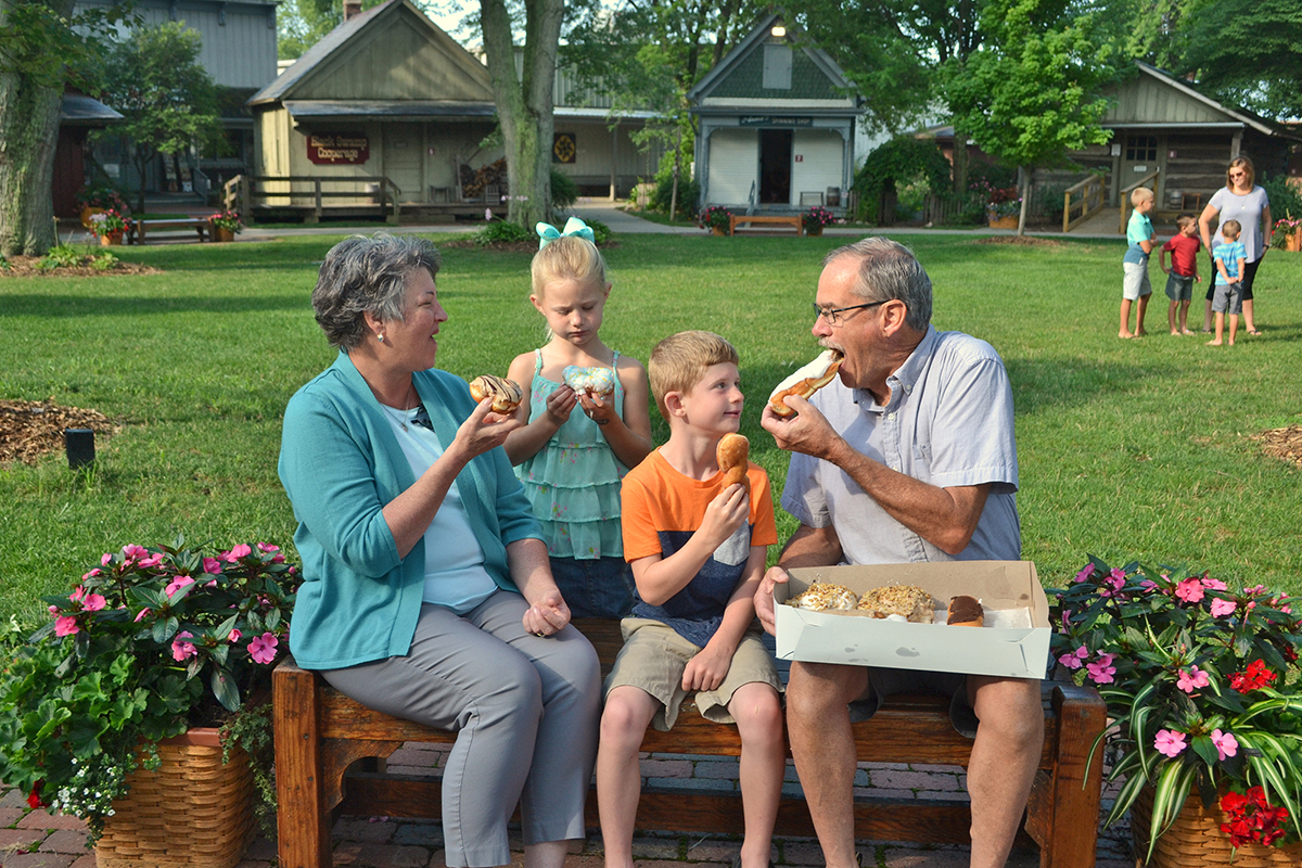 A family inhales donuts.