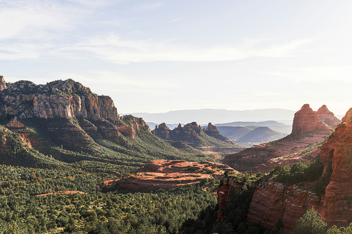 Valley flanked by pointy mountains.
