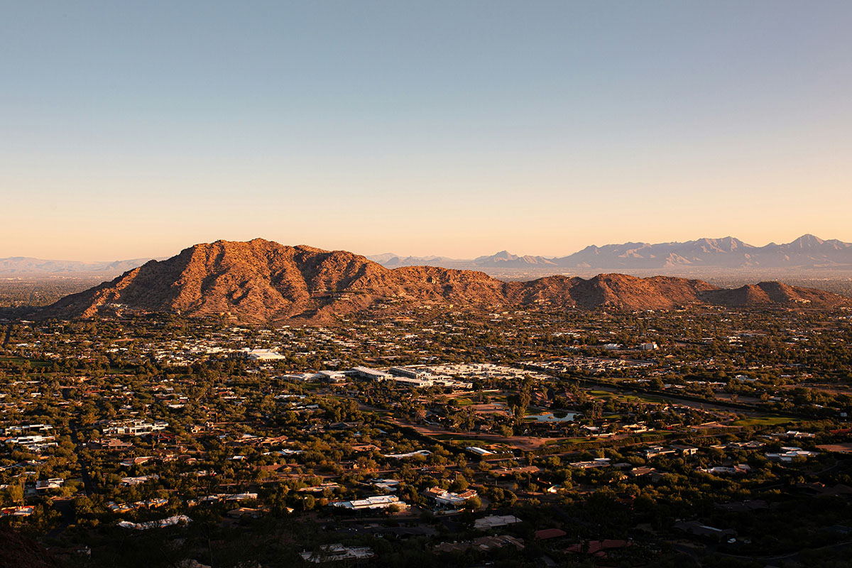 Cityscape amid mountains.