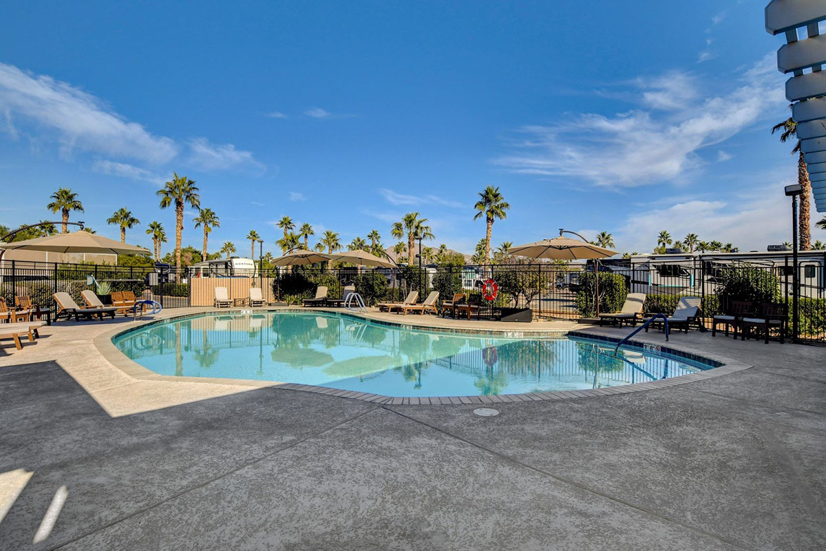 A tranquil pool under blue skies.