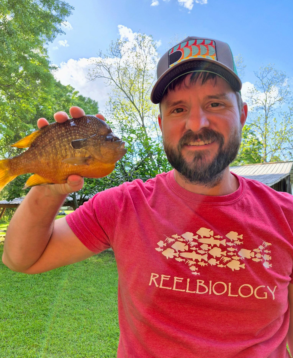 A Mississippi angler holds up a longear sunfish.