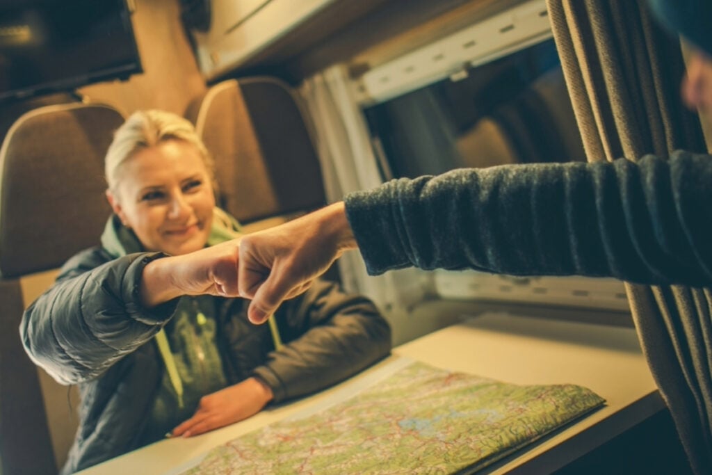 Two people fist-bumping.