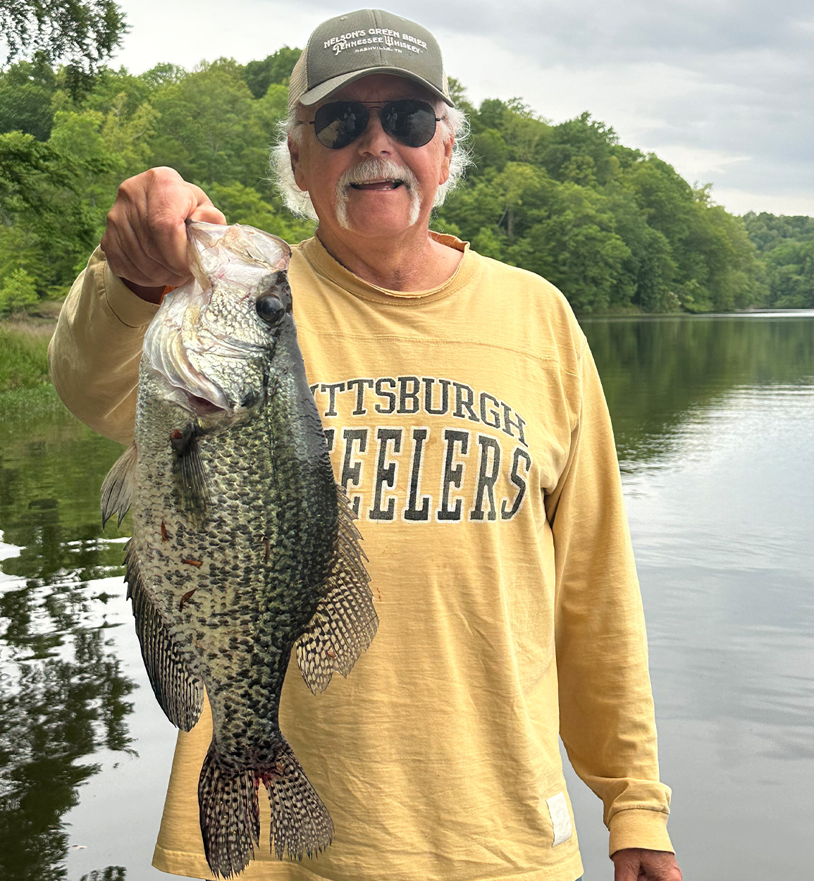A Virginia fisherman holds up a trophy crappie.