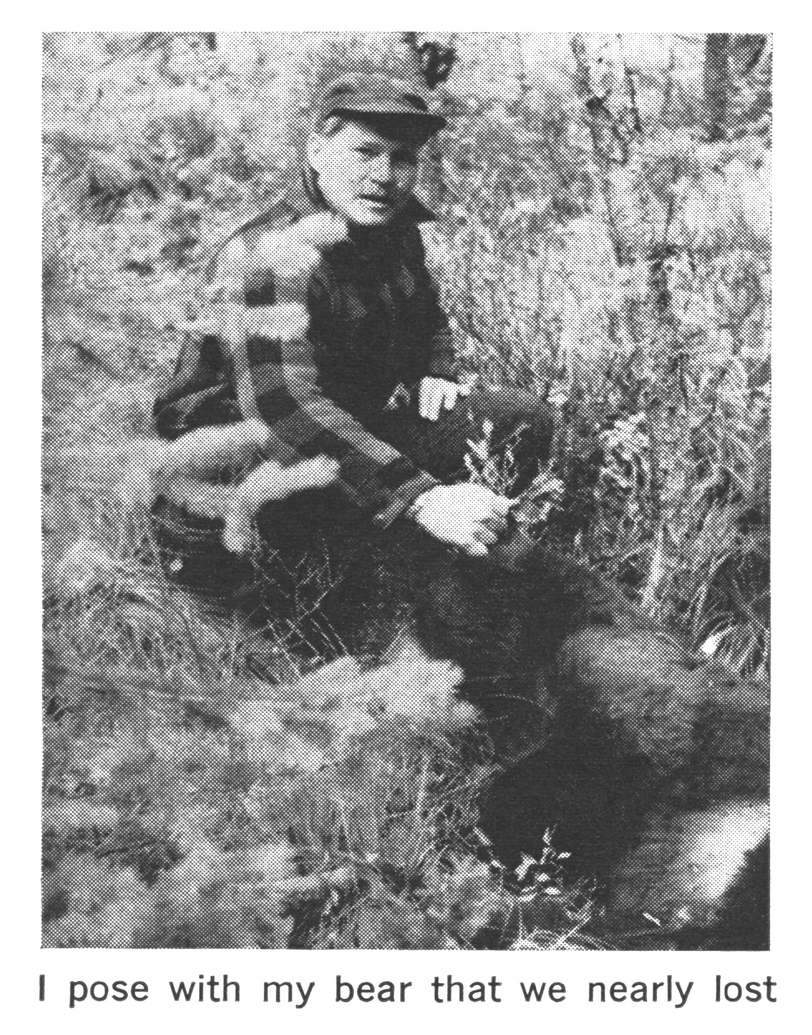 A black and white photo of a hunter with a bear