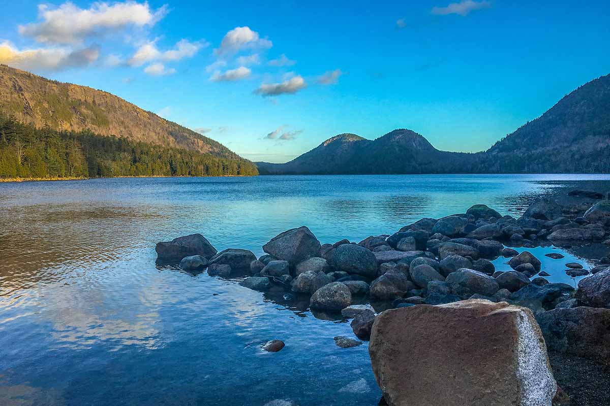 Lake under clear blue sky.