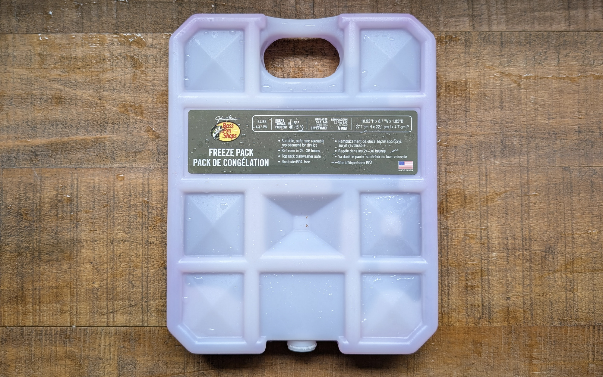  Bass Pro Shop freeze pack sitting on a wooden surface