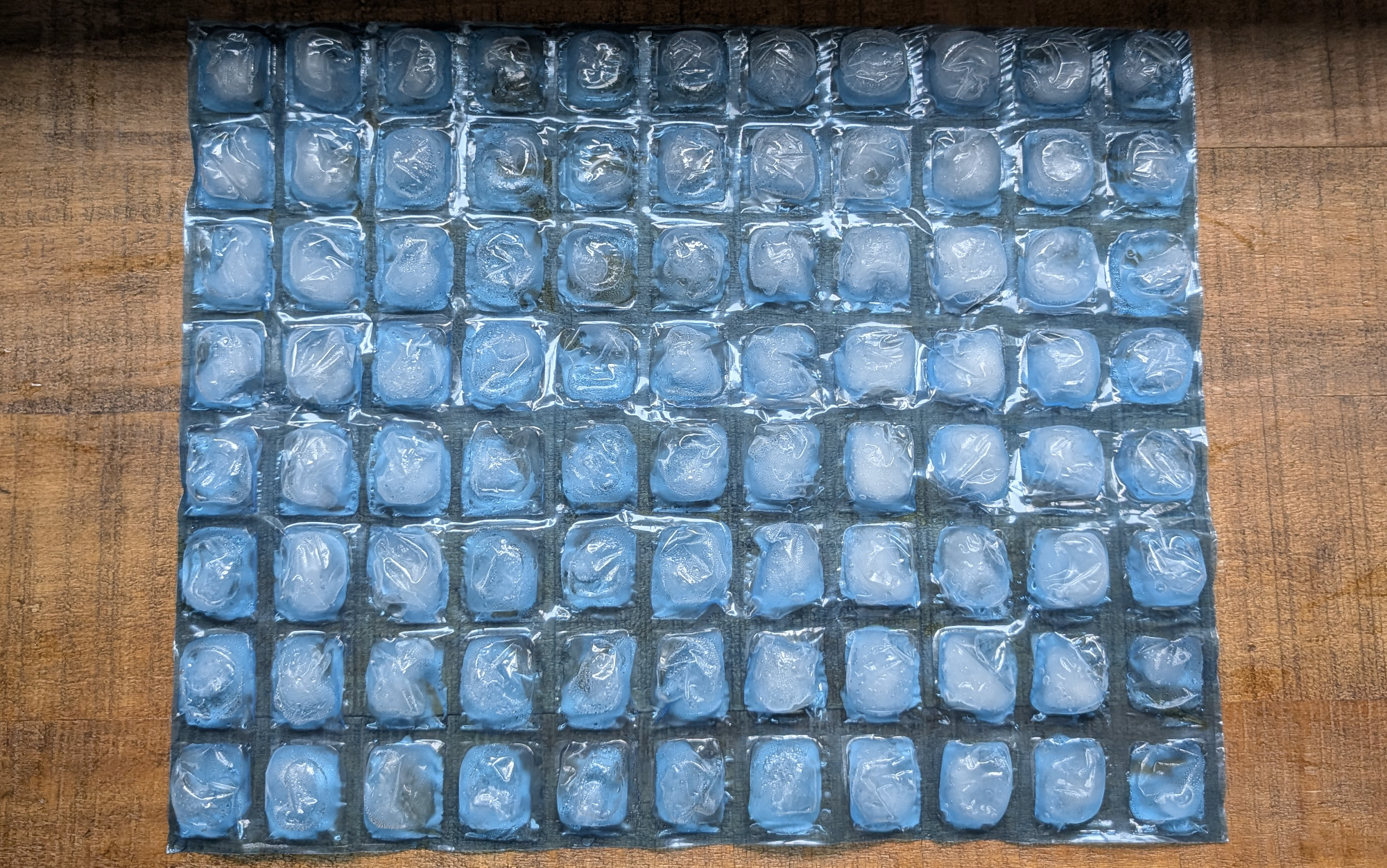 Igloo natural ice pack sitting on a wooden surface