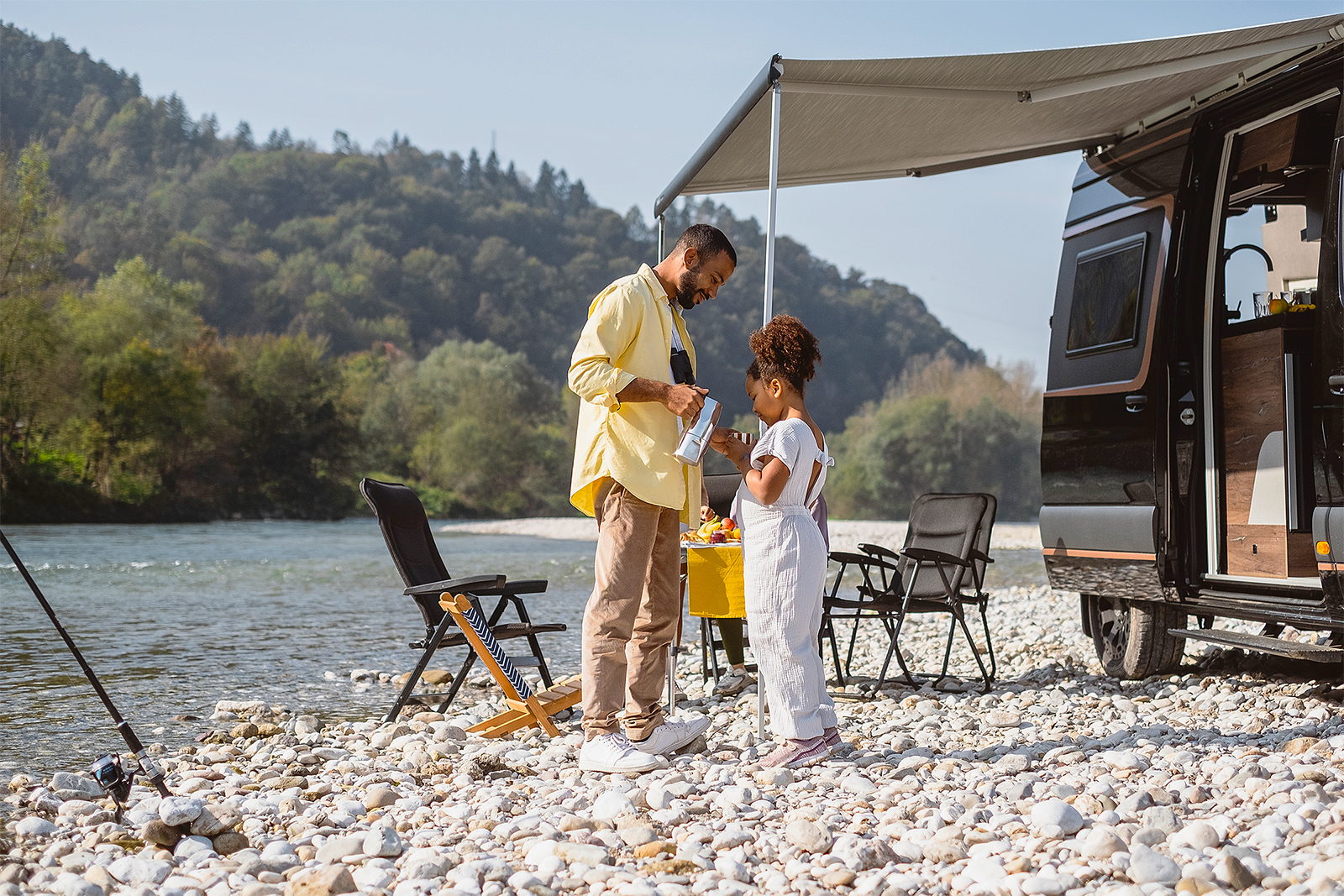 Father and daughter at campground